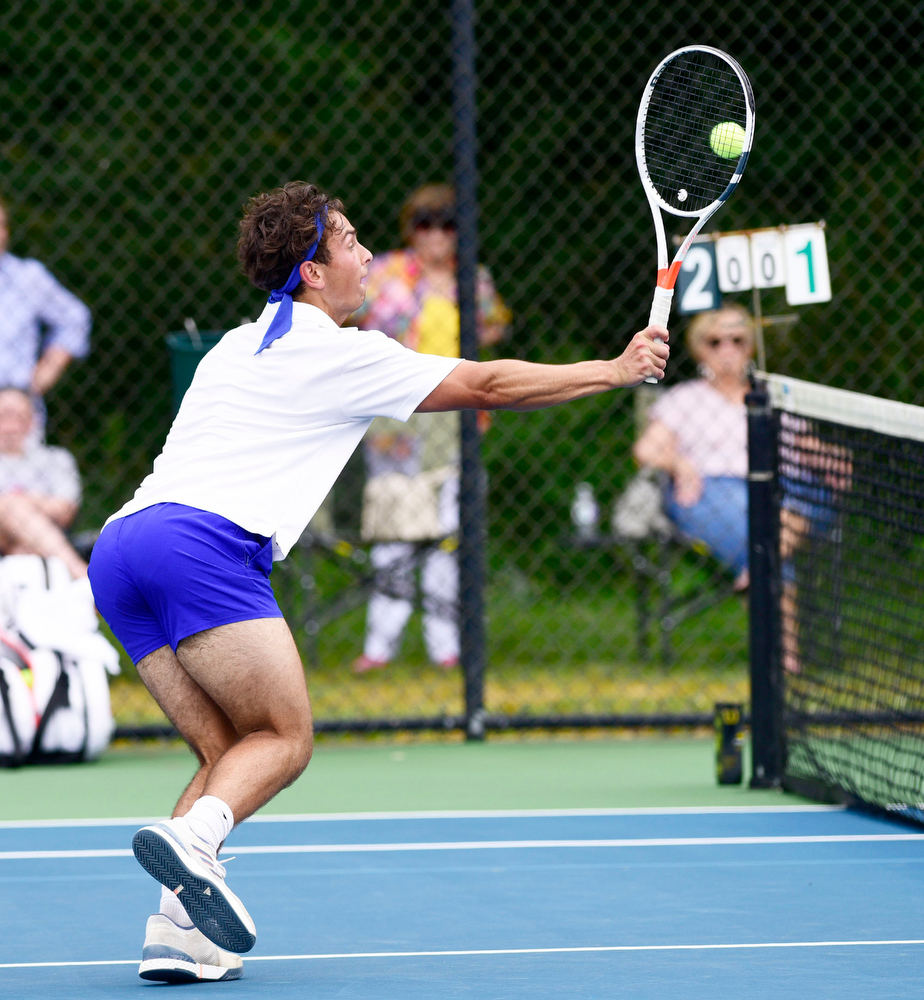 Staff Photo by Robin Rudd / Cleveland's Bryce Elliott hits a shot at the net. Elliott and Brayden Conn looks played Science Hill's On Patel and Daniel Haddadin. TSSAA Spring Fling tennis continued at the Adams Tennis Complex in Murfreesboro on May 27, 2021.