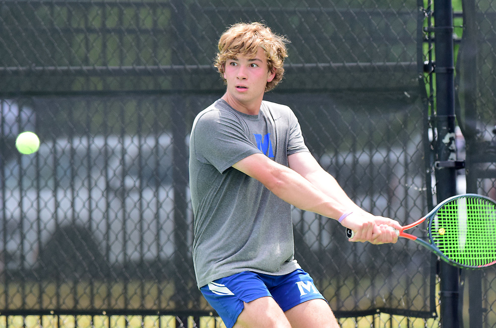 Staff Photo by Robin Rudd / McCallie's Colin Tuttle prepares to hit a backhand in his match against Ensworth's Hank Trondson in TSSAA Spring Fling tennis at the Adams Tennis Complex in Murfreesboro on May 27, 2021.