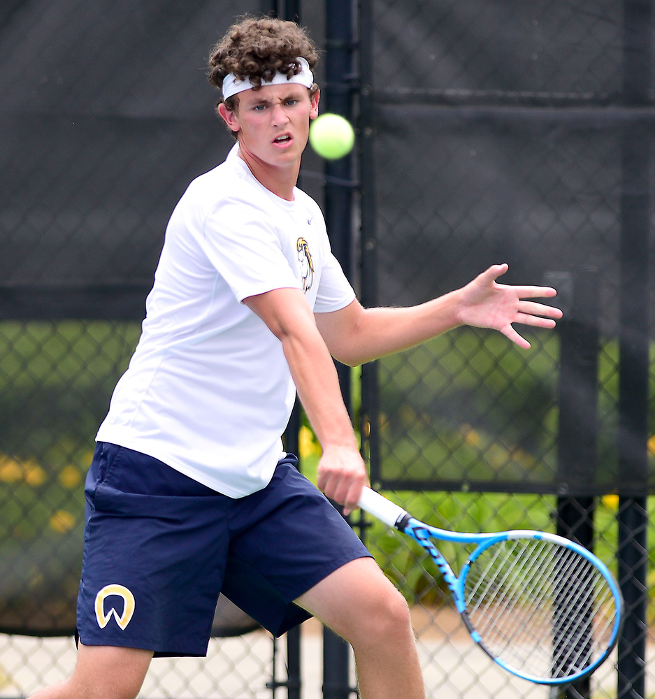 Staff Photo by Robin Rudd / Walker Valley's Jacob Johnson hits a backhand during his match with Collierville's Ranjay Auil at the Adams Tennis Complex in Murfreesboro on May 27, 2021.