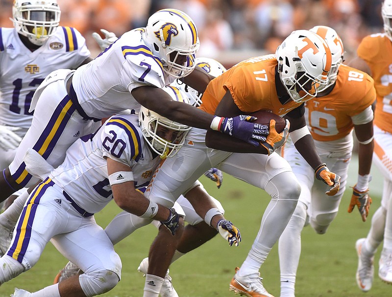 Staff photo by Robin Rudd / Former Tennessee receiver Brandon Johnson, shown as a freshman in November 2016, extends for extra yards during a 55-0 home win over Tennessee Tech. The Vols and Golden Eagles play again this season, but the game will be available only digitally.