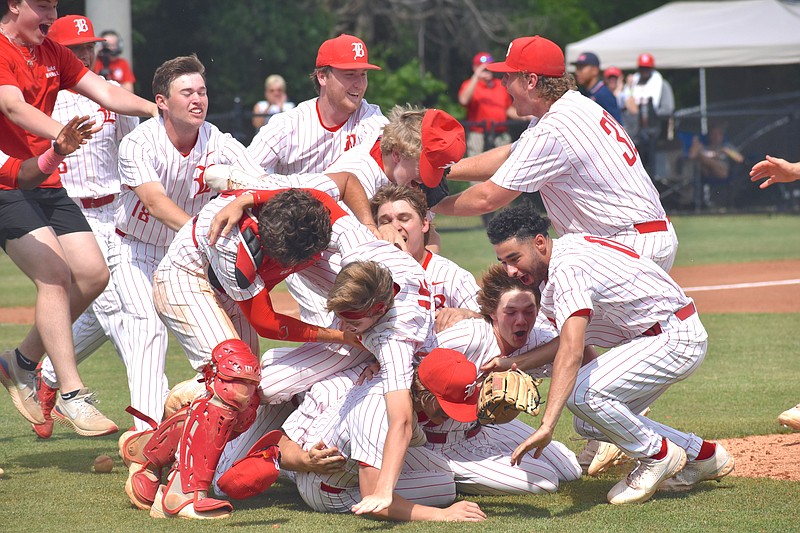 Staff photo by Patrick MacCoon / The Baylor School baseball team celebrates winning its third straight TSSAA Division II-AA state championship after Thursday's 8-1 victory over Briarcrest Christian at Wilson Central High School in Lebanon, Tenn.