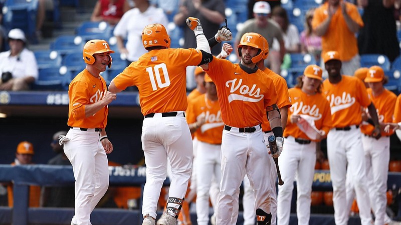 Tennessee Athletics photo by Caleb Jones / Tennessee's Pete Derkay (10) is congratulated by teammates after his three-run home run in the second inning opened the floodgates to a 12-2 drubbing of Mississippi State on Thursday in the SEC tournament.