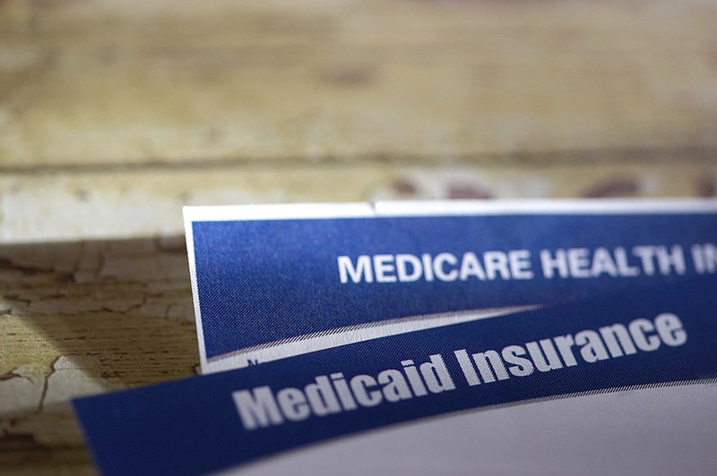 Close up shot of Medicaid and Medicare cards. / Photo credit: Getty Images/iStock/Kameleon007