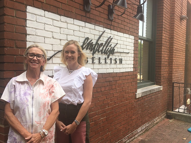 Staff photo by Mary Fortune / Embellish owner Terri Holley, left, has sold the business to Ann Trammell Newton, who has been shopping at the store since she was a boarding student at Baylor School.