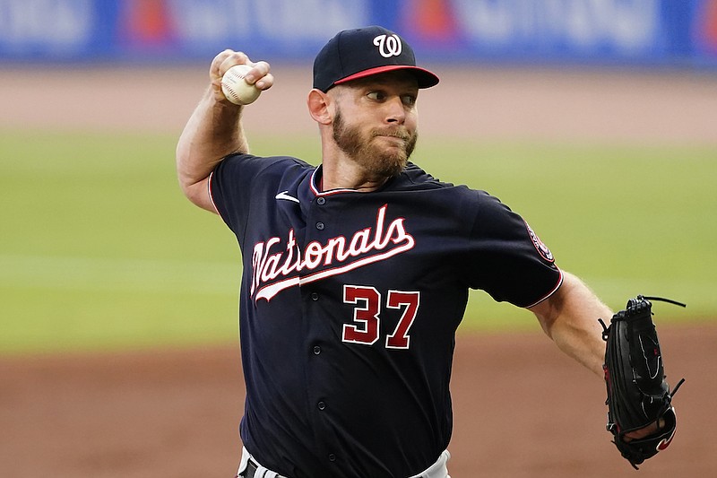Washington Nationals starting pitcher Stephen Strasburg delivers in the first inning of a baseball game against the Atlanta Braves Tuesday, June 1, 2021, in Atlanta. (AP Photo/John Bazemore)