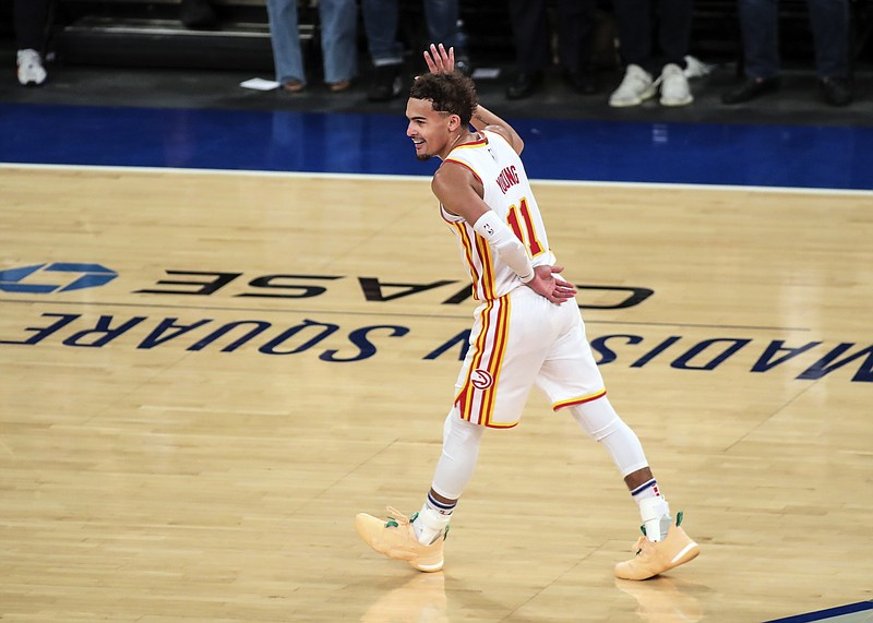 AP photo by Wendell Cruz / Atlanta Hawks guard Trae Young waves to the crowd after making a 3-pointer against the host New York Knicks on Wednesday night.