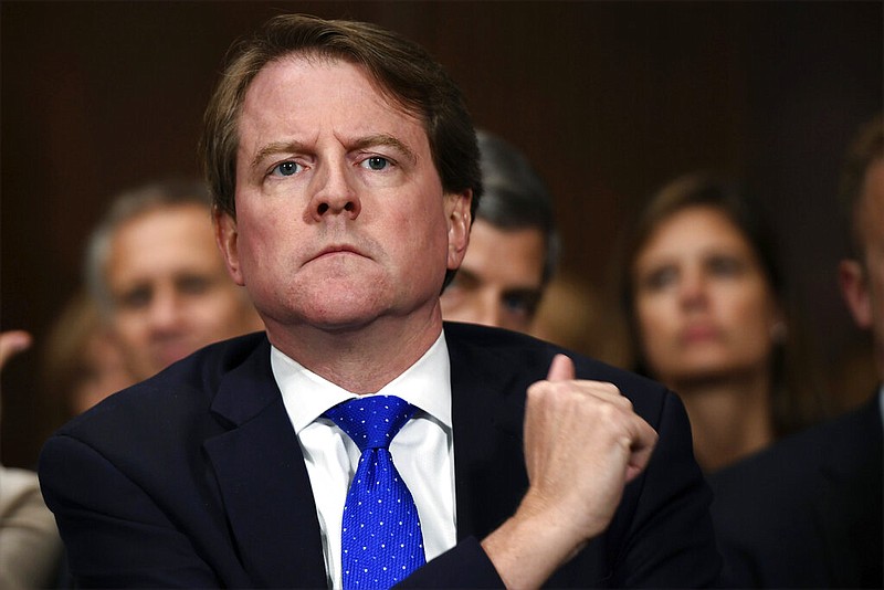 In this Sept. 27, 2018, file photo, then-White House counsel Don McGahn listens as Supreme court nominee Brett Kavanaugh testifies before the Senate Judiciary Committee on Capitol Hill in Washington. After years of trying, the House Judiciary Committee is set to question McGahn on June 4, 2021, two years after House Democrats originally sought his testimony as part of investigations into former President Donald Trump. (Saul Loeb/Pool Photo via AP, File)