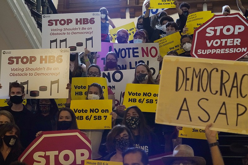 Photo by Eric Gay of The Associated Press / A group opposing new voter legislation gather outside the House Chamber at the Texas Capitol in Austin, Texas on Thursday, May 6, 2021.