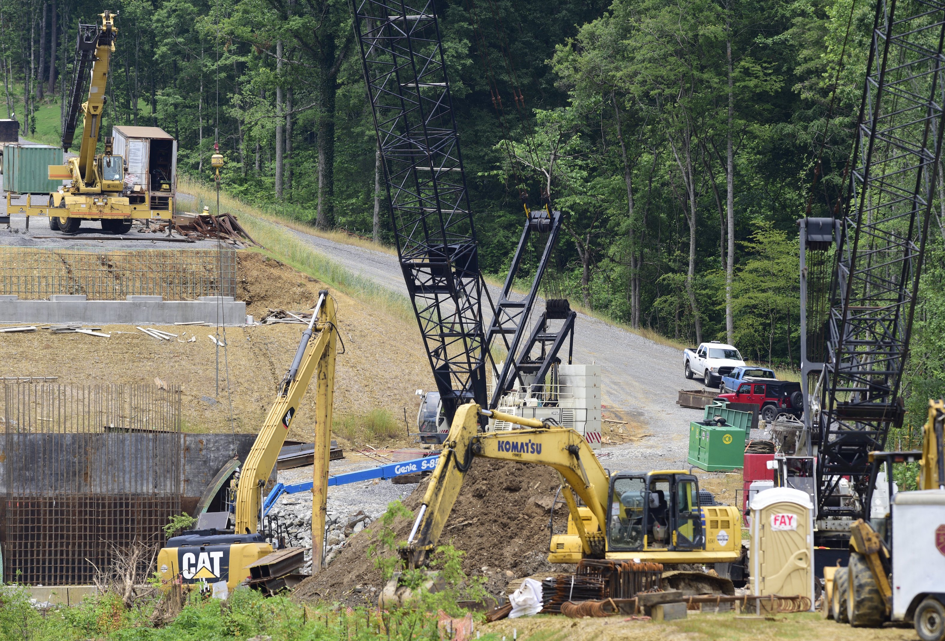 Staff Photo by Robin Rudd / Contractor Charles Blalock and Sons, Inc. contiunes on the State Route-40 (US-64) bridge over the Ocoee River on June 4, 2021. The contractor is working on foundations for the new bridge and relocation of utilities Brief intermittent lane closures are possible Monday through Friday 8 AM to 5:30 PM to allow for utility work and moving equipment/supplies.