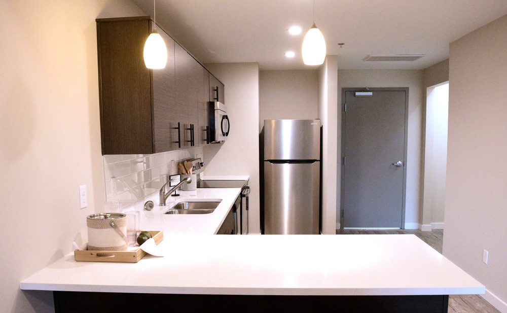 Staff Photo by Robin Rudd / Shown is the kitchen area of one of the apartments at the Burnside. Partners Dede and Towson Engsberg, of SEI Ventures of Tennessee, LLC have teamed with Nathan and Doug Kirkman of DNK Development, LLC to renovate the former Acme Box Company as the Burnside. The Burnside, located at 2100 Rossville Avenue will feature apartments, a restaurant, offices, and retail spaces.