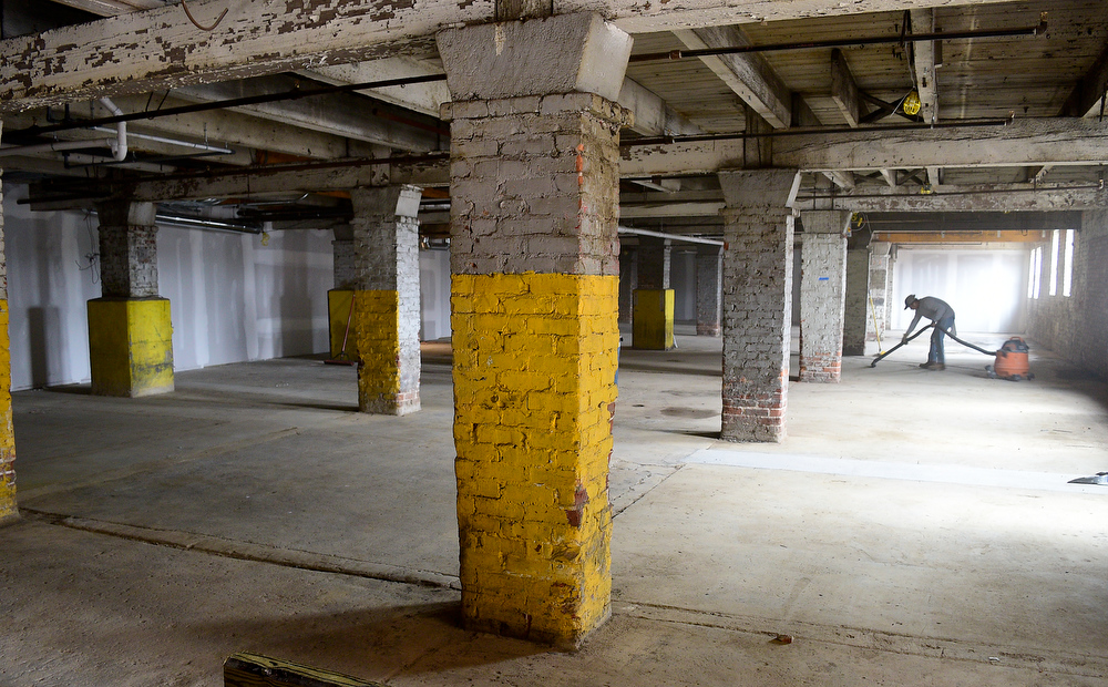 Staff Photo by Robin Rudd / Former industrial interiors will be converted to office and retail space at the Burnside. Partners Dede and Towson Engsberg, of SEI Ventures of Tennessee, LLC have teamed with Nathan and Doug Kirkman of DNK Development, LLC to renovate the former Acme Box Company as the Burnside. The Burnside, located at 2100 Rossville Avenue will feature apartments, a restaurant, offices, and retail spaces.