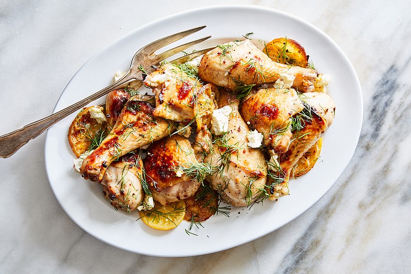 Serve this Chile-Roasted Chicken, flavored with honey, lemon and feta, with a loaf of crusty bread or flatbread for scooping up all the tangy pan juices. / Photo by Linda Xiao/The New York Times
