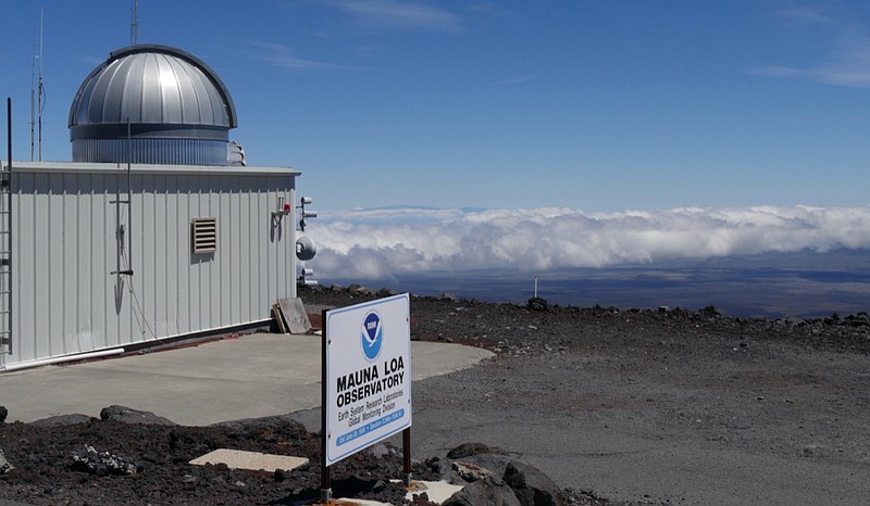 This 2019 photo provided by NOAA shows the Mauna Loa Atmospheric Baseline Observatory, high atop Hawaii's largest mountain in order to sample well-mixed background air free of local pollution. Heat-trapping carbon dioxide levels in the air peaked in May 2021, in amounts nearly 50% higher than when the industrial age began and they are growing at a record fast rate, scientists reported Monday, June 7, 2021. (Susan Cobb/NOAA Global Monitoring Laboratory via AP)