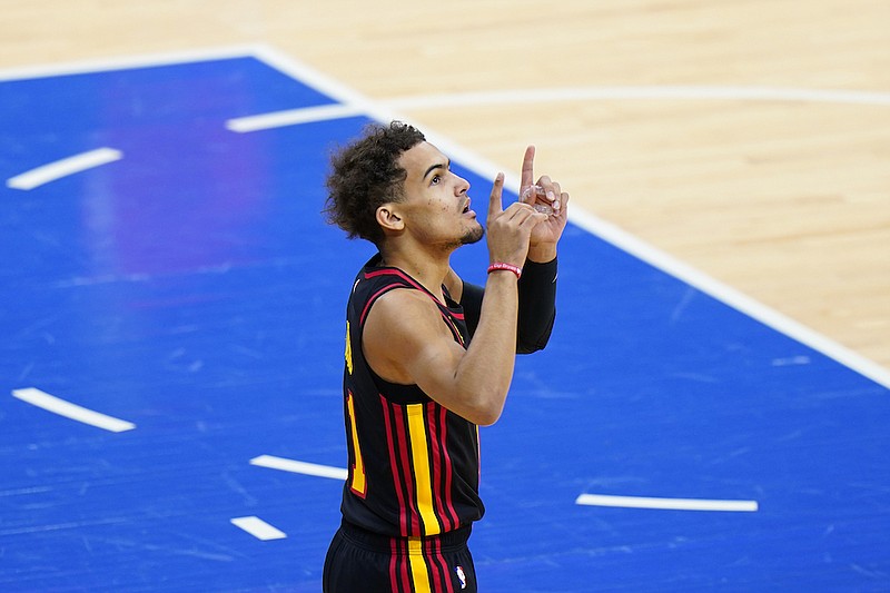 Atlanta Hawks' Trae Young reacts during Game 1 of a second-round NBA basketball playoff series against the Philadelphia 76ers, Sunday, June 6, 2021, in Philadelphia. Young became the second player in NBA history to score 30 points in each of his first four career playoff road games. The latest came in Atlanta's surprising Game 1 victory in Philadelphia. (AP Photo/Matt Slocum)