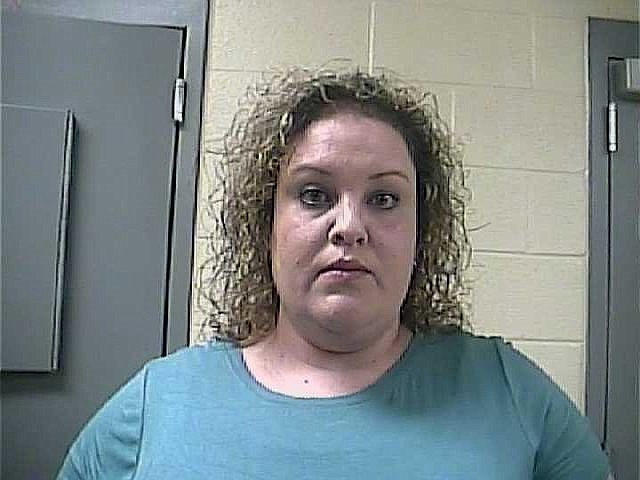 Contributed photo / Courtney Conley, 33, of Marion County, Tenn., is charged with theft over $10,000, official misconduct, tampering with evidence and 18 counts of forgery.