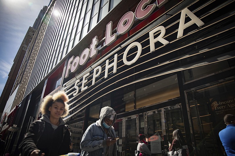 People walk outside a Sephora store in New York on Friday, May 7, 2021. The beauty retailer recently announced a commitment to devote at least 15% of its store shelves to Black-owned brands. (AP Photo/Robert Bumsted)