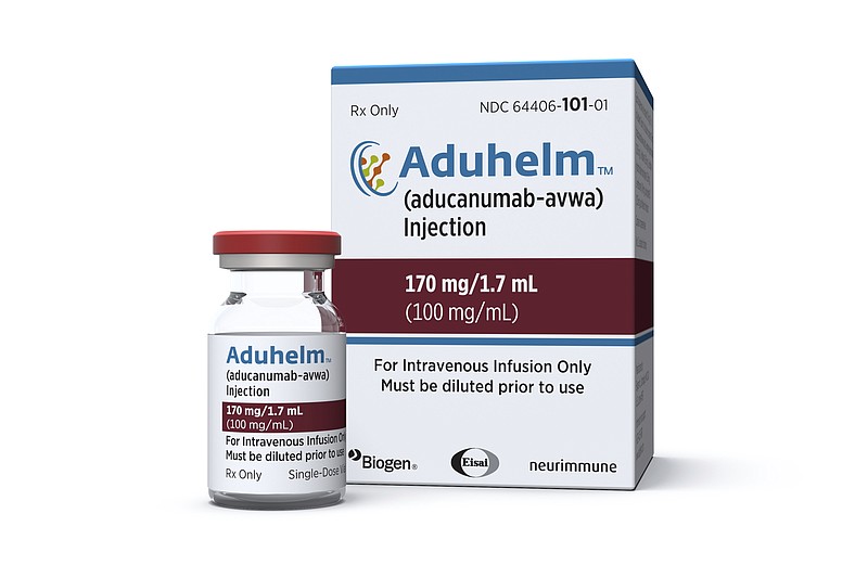 This image provided by Biogen on Monday, June 7, 2021 shows a vial and packaging for the drug Aduhelm. On Monday, June 7, 2021, the Food and Drug Administration approved Aduhelm, the first new medication for Alzheimer's disease in nearly 20 years, disregarding warnings from independent advisers that the much-debated treatment hasn't been shown to help slow the brain-destroying disease. (Biogen via AP)