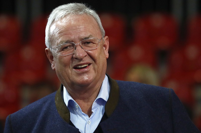 FILE - In this Nov. 30, 2018 file photo Martin Winterkorn, former CEO of the German car manufacturer 'Volkswagen', arrives for the annual general meeting of FC Bayern Munich soccer club in Munich, Germany. Volkswagen says the executive in charge during the company's diesel scandal will pay the firm 11.2 million euros ($13.6 million) in compensation. The company said in a statement Wednesday, June 9, 2021 that an investigation showed former CEO Martin Winterkorn failed to get to the bottom of the scandal quickly after regulators started asking questions, and didn't ensure truthful answers to the inquiries. (AP Photo/Matthias Schrader, file)