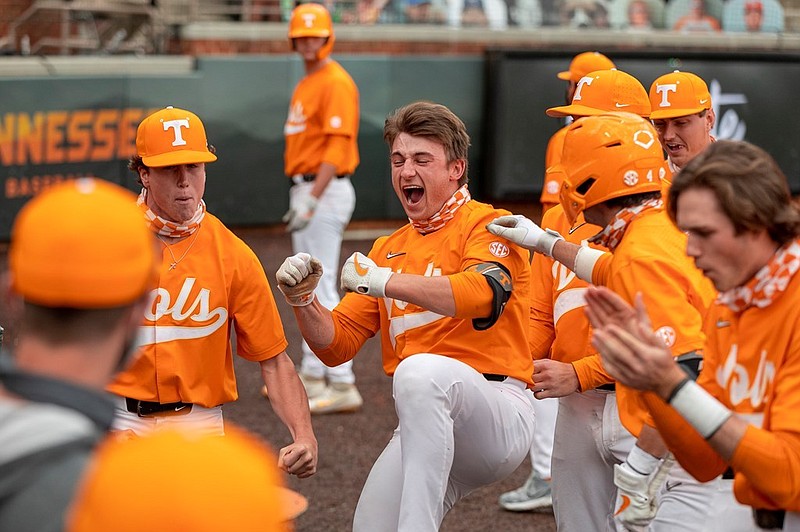 Tennessee Athletics photo / Tennessee's Evan Russell celebrates with teammates during his three-homer performance against Vanderbilt on April 17.
