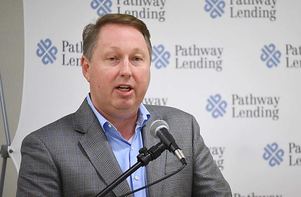 Staff Photo by Matt Hamilton / Pathway Lending president Clint Gwin speaks during an event at the Urban League Office on Wednesday, June 9, 2021.