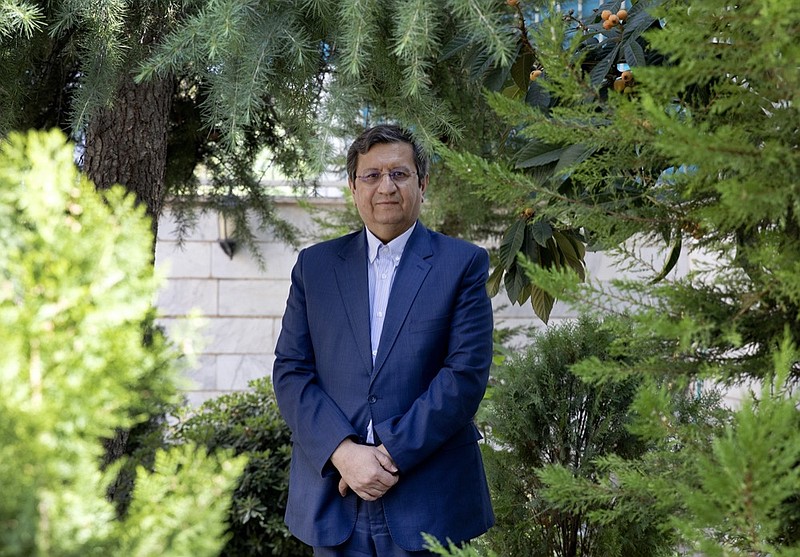 Former Iranian Central Bank chief Abdolnasser Hemmati poses for a photo at his office in Tehran, Iran, Wednesday, June 9, 2021. (AP Photo/Ebrahim Noroozi)


