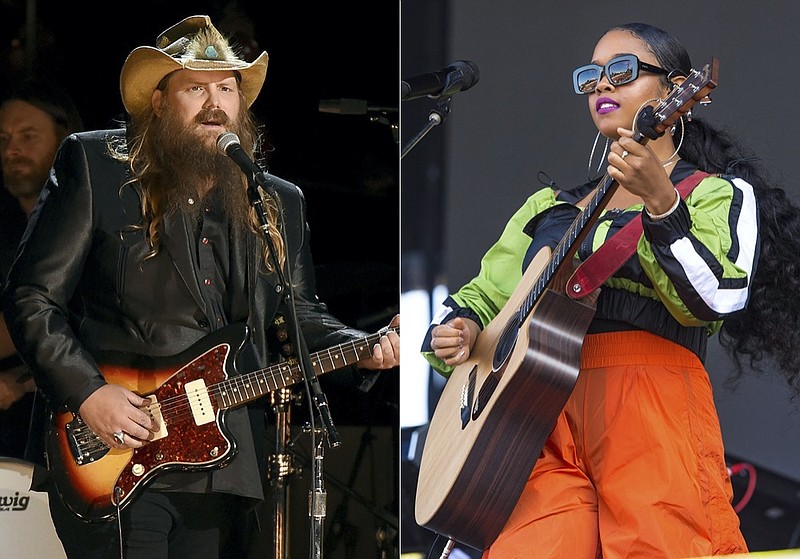 Chris Stapleton performs at the 50th annual CMA Awards on Nov. 2, 2016, in Nashville, Tenn., left, and H.E.R. performs at Lollapalooza on Aug. 1, 2019, in Chicago. (AP Photo)


