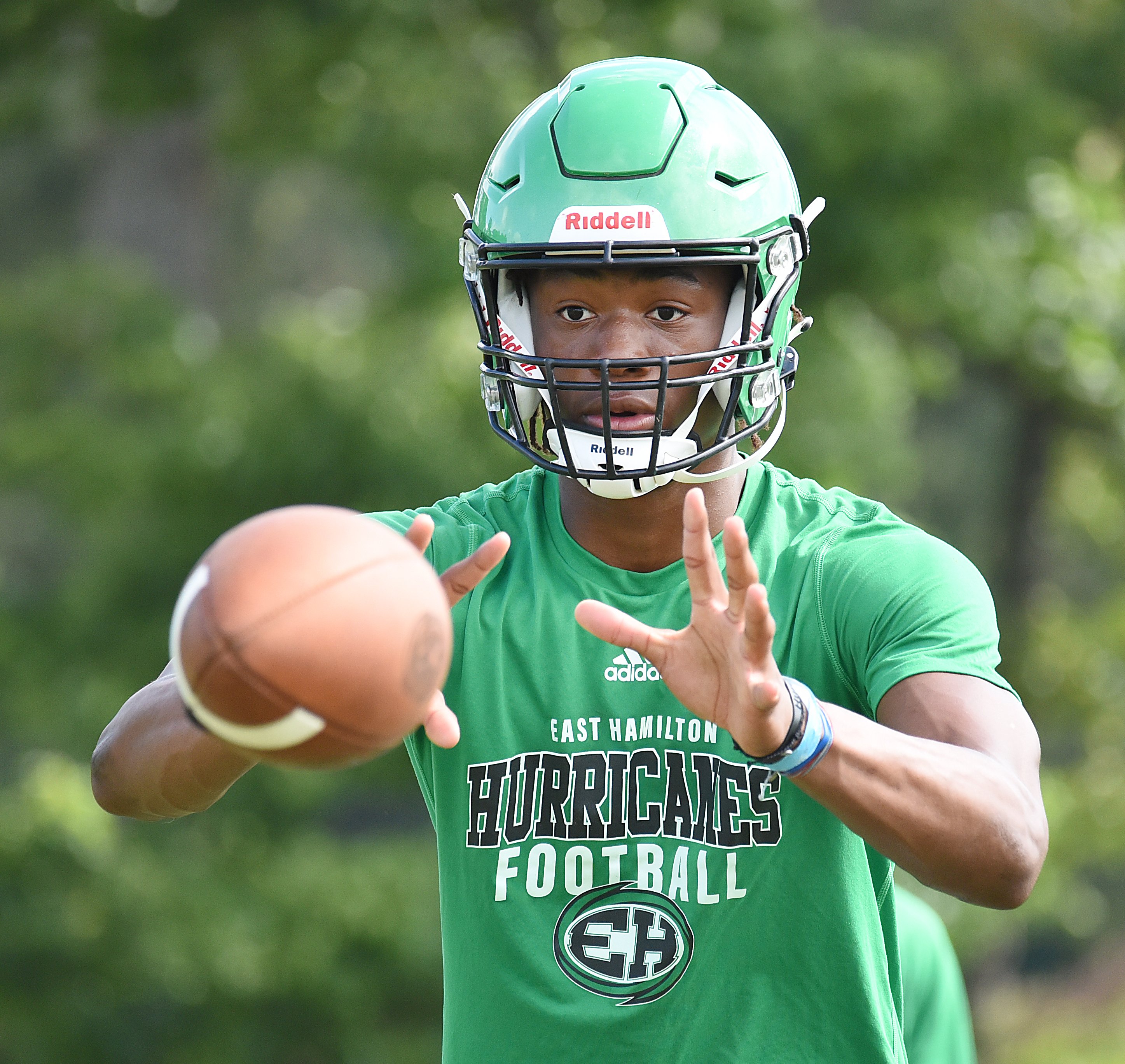 Staff file photo by Matt Hamilton / East Hamilton senior Jeremiah Flemmons is the likely starter at quarterback for the Hurricanes in 2021, but his football future is expected to include a move to wide receiver in college.