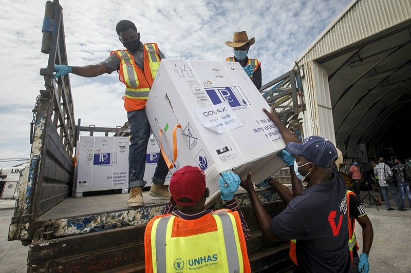 FILE - In this March 15, 2021, file photo, boxes of COVID-19 vaccine provided through the COVAX global initiative arrive at the airport in Mogadishu, Somalia. (AP Photo/Farah Abdi Warsameh, File)


