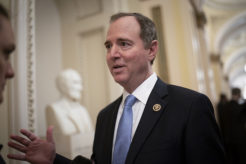 In this Tuesday, March 3, 2020, file photo, House Intelligence Committee Chairman Adam Schiff, D-Calif., talks to reporters as lawmakers work to extend government surveillance powers that are expiring soon, on Capitol Hill in Washington. House Speaker Nancy Pelosi and other top Democrats called for an investigation on Thursday, June 10, 2021, after The New York Times reported that the Justice Department under President Donald Trump seized the communications data of members of the House Intelligence Committee, including those of Schiff. (AP Photo/J. Scott Applewhite, File)