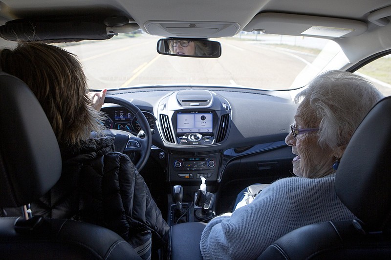 Staff photo by C.B. Schmelter / Susan Gruber, left, drives 90-year-old Bonnie Baker to a medical appointment on Thursday, Feb. 27, 2020, in Red Bank. Gruber, who drives with MyRide TN, took Baker to a medical appointment.