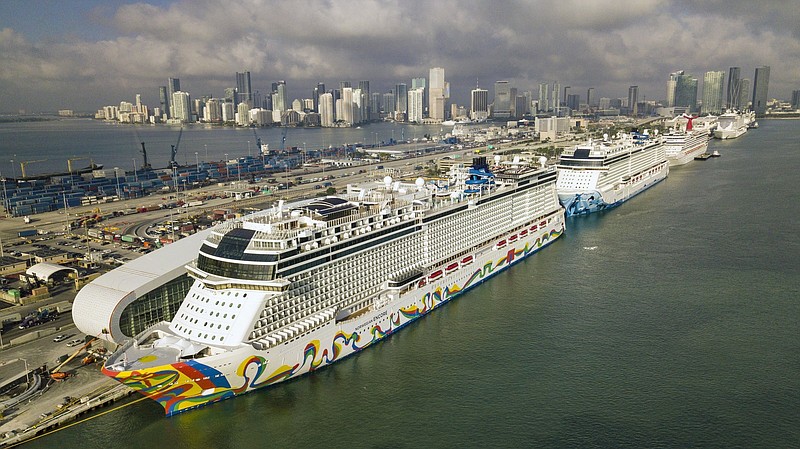 File photo / The Norwegian Encore cruise ship is docked at the Port of Miami in 2020, in Miami, Fla.