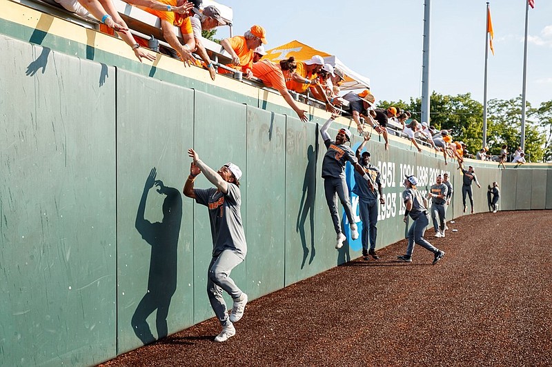Tennessee Athletics photo / Tennessee baseball players celebrate with fans following Sunday's 15-6 whipping of LSU that clinched the first College World Series appearance for the Volunteers since 2005.