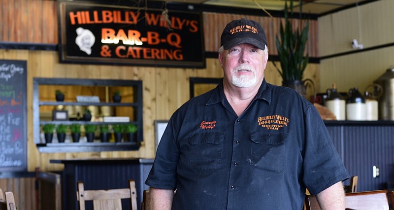 Staff Photo by Robin Rudd / George Foster is the owner and chief smoker at Hillbilly Willy's, at 115 Browns Ferry Road in Lookout Valley.