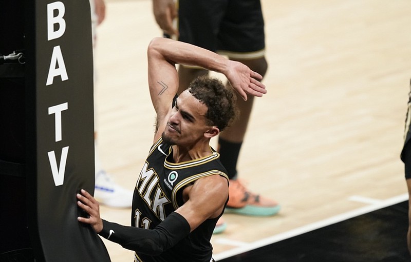 Atlanta Hawks' Trae Young reacts after missing a basket during the second half of Game 4 of a second-round NBA basketball playoff series against the Philadelphia 76ers, Monday, June 14, 2021, in Atlanta. (AP Photo/Brynn Anderson)



