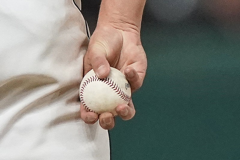 AP photo by Tony Dejak / Cleveland Indians reliever James Karinchak holds the ball between pitches during the eighth inning of Tuesday's game against the visiting Baltimore Orioles.