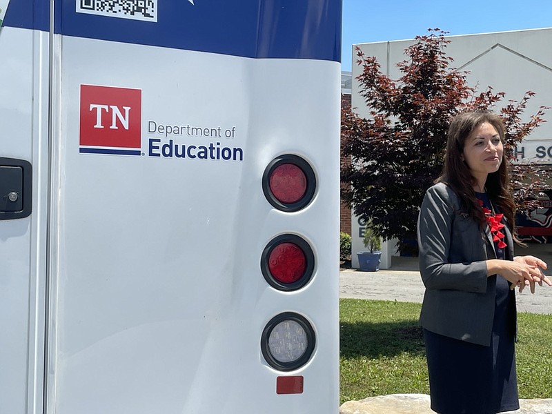 Photo by Anika Chaturvedi | Following the roundtable discussion, Education Commissioner Penny Schwinn talks with reporters by the Accelerating TN 2021 tour bus at Red Bank High School on Thursday, June 17, 2021, in Chattanooga, Tennessee.

