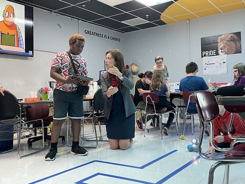 Photo by Anika Chaturvedi | Education Commissioner Penny Schwinn talks with rising sixth-grade students working with robotics during Hamilton County Schools' Summer REACH program at Red Bank Elementary School on Thursday, June 17, 2021, in Chattanooga, Tennessee.

