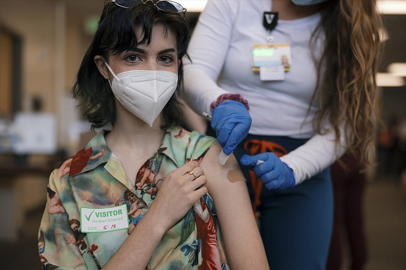 Calysta Magne-Gordon, 13, of Nashville, Tenn., after receiving a first dose of the Pfizer-BioNTech COVID-19 vaccine at Vanderbilt Health in Nashville on May 13, 2021. The mass coronavirus inoculation campaign for children kicked off in earnest in the United States on Thursday after the federal government recommended making the Pfizer-BioNTech vaccine available to those aged 12 to 15. (Brett Carlsen/The New York Times)