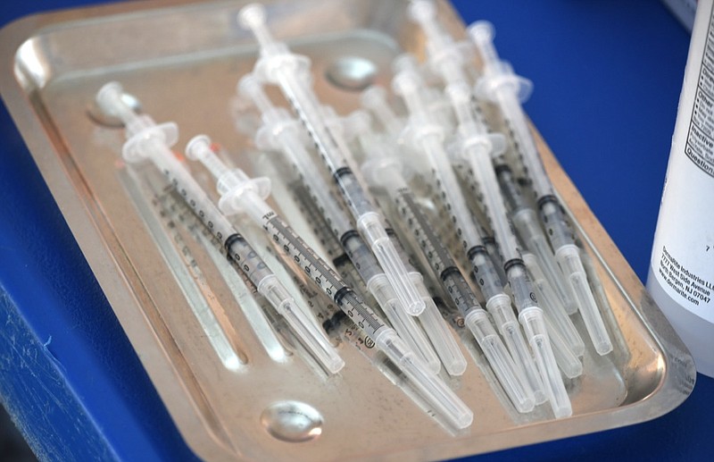 Staff Photo by Matt Hamilton / Syringes filled with doses of COVID-19 vaccine are ready for use at First Baptist Cleveland in Cleveland, Tenn. on Tuesday, March 30, 2021.