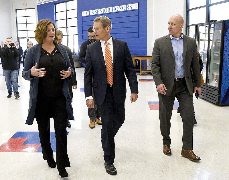 Staff Photo by Robin Rudd/ From left, Cleveland High School Principal Autumn O'Bryan talks with Governor Bill Lee, and state representative Mark Hall, as she leads a tour of the school. Tennessee Governor Bill Lee toured Cleveland High School to see the work teachers and students are doing to prepare students for career, college, and life readiness on January 7, 2020.