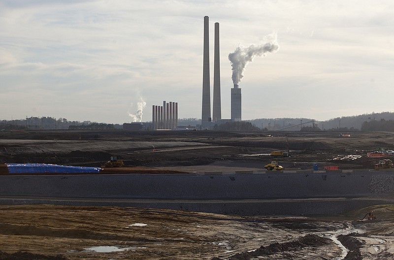 Staff file photo / In this 2012 file photo, water vapor streams from the top of a scrubber tower at the Kingston Fossil Plant in Harriman, Tenn.