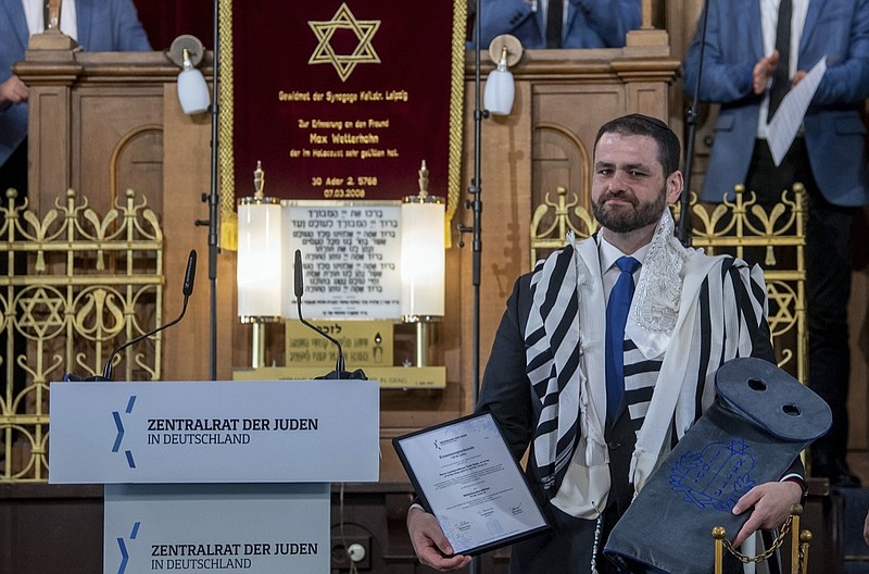 Zsolt Balla, State Rabbi of Saxony, stands in the synagogue in Leipzig, Germany, Monday June 21, 2021, after his induction into the office of Military Rabbi of the Armed Forces. The German military got its first rabbi in over a century on Monday, with the inauguration to the post of Hungarian-born Zsolt Balla at a synagogue in Leipzig. (Hendrik Schmidt/dpa via AP)