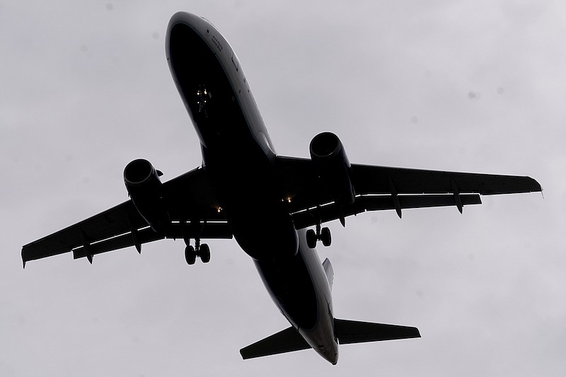 In this Tuesday, March 9, 2021, file photo, an airline arrives at Salt Lake City International Airport, in Salt Lake City. Airlines have reported about 3,000 cases of disruptive passengers since Jan. 1, according to a spokesman for the Federal Aviation Administration. It has gotten so bad that the airlines, flight attendants and pilots sent a letter to the U.S. Justice Department on Monday, June 21, urging "that more be done to deter egregious behavior."(AP Photo/Rick Bowmer, File)