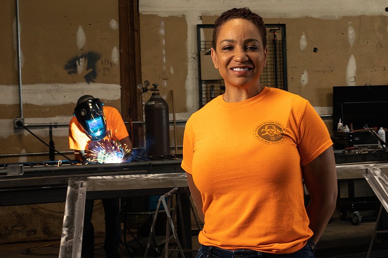 Staff photo by Troy Stolt / Chanda Chambers at the Taft Avenue headquarters of Chambers Welding and Fabrication, the company she launched with her husband in 2015.