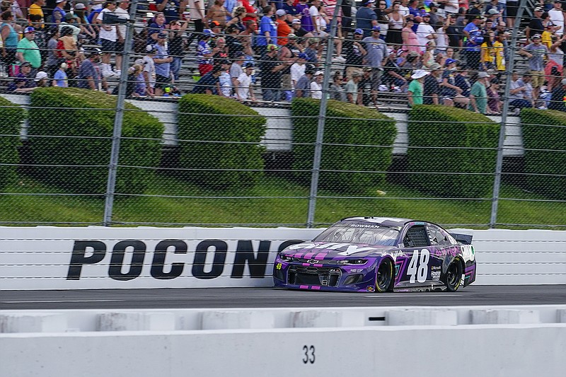 AP photo by Matt Slocum / Alex Bowman motors down the front straightaway near the end of Saturday's NASCAR Cup Series race in Long Pond, Pa.