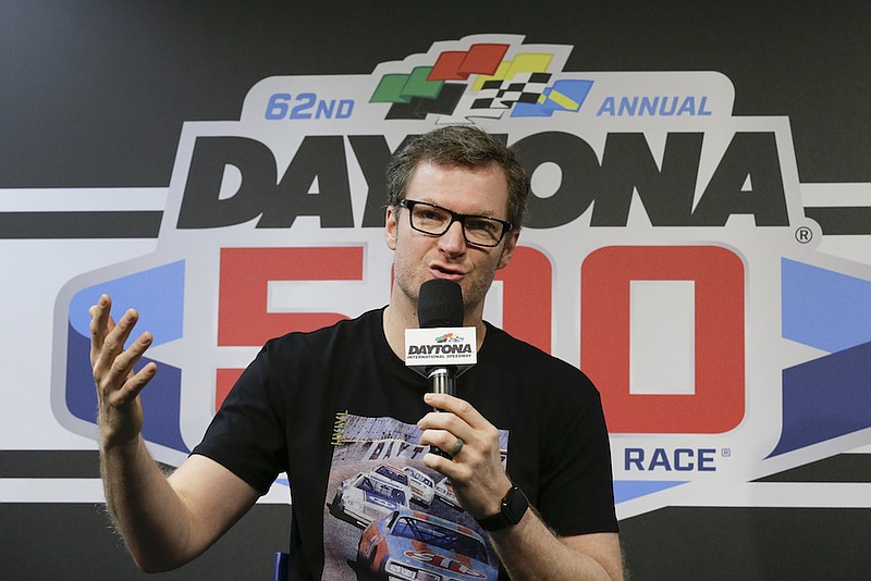 Dale Earnhardt Jr., team owner and TV analyst, answers questions during a news conference before the NASCAR Daytona 500 auto race at Daytona International Speedway in Daytona Beach, Fla., in this Sunday, Feb. 16, 2020, file photo. There's a pointed episode in Dale Earnhardt Jr.'s television show that encapsulates Earnhardt's remarkable transformation from a bashful third-generation racer into a multimedia personality.  (AP Photo/Terry Renna, File)