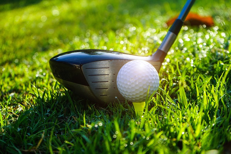 Close-up of golf ball on grass - golf tile. / Photo credit: Getty Images/iStock/Somchai Sookkasem / EyeEm