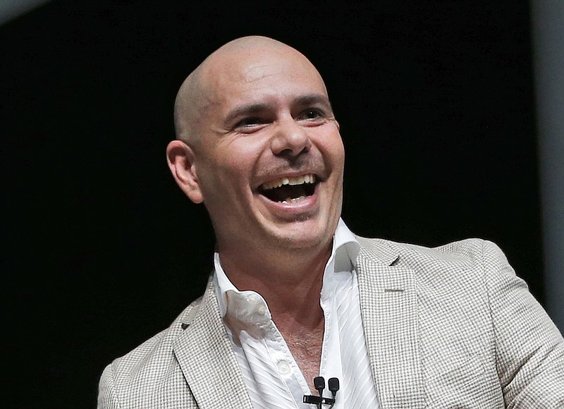In this April 19, 2016, file photo, Pitbull appears at the eMerge Americas technology event in Miami Beach, Fla. (AP Photo/Wilfredo Lee, File)