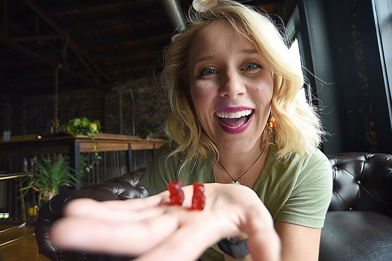 Staff Photo by Matt Hamilton / Lauren Mindermann with some of her CBD-infused treats at Proof Bar and Incubator in Chattanooga on Wednesday, June 9, 2021.