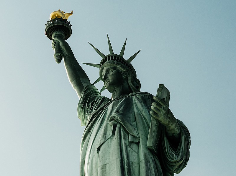 New York Times file photo by Vincent Tullo / The Statue of Liberty overlooks New York Harbor.